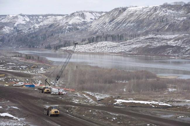 The latest figure on the cost of the dam is $10.7 billion and when complete on the Peace River in northeast B.C. it would power the equivalent of 450,000 homes a year. (THE CANADIAN PRESS/Jonathan Hayward)