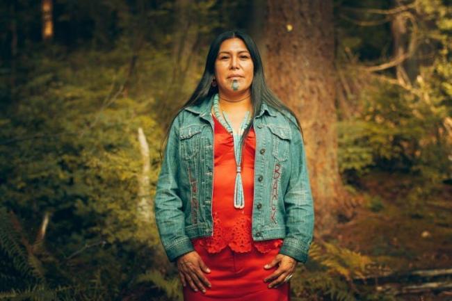 Kanahus Manuel, birth keeper and member of the Tiny House Warriors. The tiny homes provide housing for Secwe̓pemc families, while acting as a barrier to the TMX expansion. Photo supplied by Kanahus Manuel