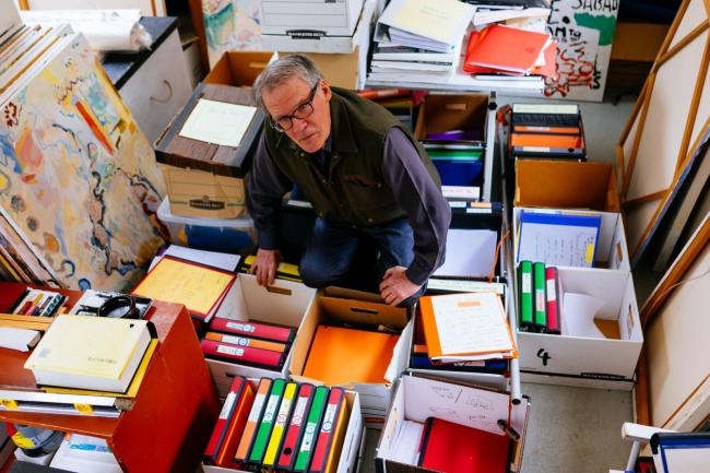 retired lawyer David Gooderham among his files on climate change at home in Vancouver, B.C. on Jan. 25, 2019. Photo by Michael Ruffolo