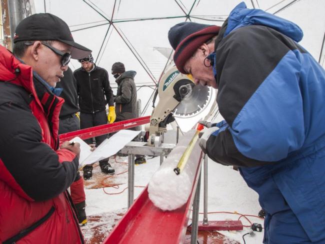 Researchers extracting an ice core from the Guliya Ice Cap in the Tibetan Plateau in 2015. (Lonnie Thompson / Ohio State University)
