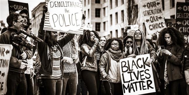 A Black Lives Matter protest (November 2015). Photo by Johnny Silvercloud via Wikimedia Commons.