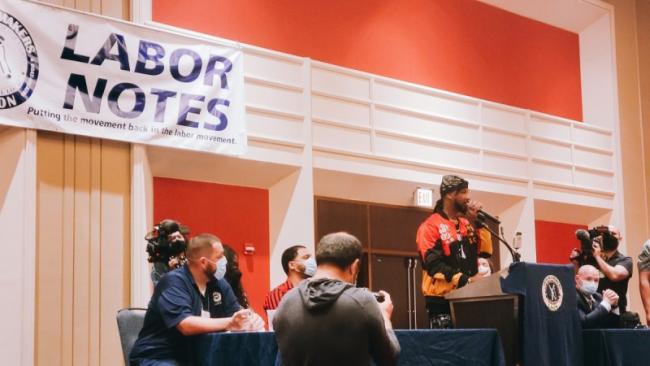 Chris Smalls addresses attendants at the 2022 Labor Notes Conference. Photo by James Hutt.