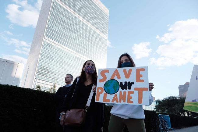 A group of students take part in a protest in support of the climate and against fossil fuel and other contributors to global warming in front of the United Nations on October 1, 2021, in New York City. SPENCER PLATT / GETTY IMAGES