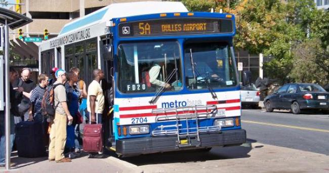  Photo: Passengers board bus headed for Dulles International Airport, Washington, DC. Ben Schumin.