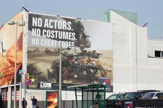  Army recruitment sign at E3. Rob Fahey from London, United Kingdom. Wikimedia Commons