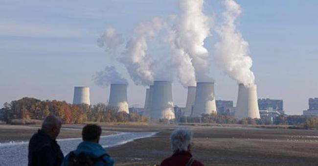 People look at a coal-fired power plant in Peitz, Germany on October 29, 2021. (Photo: Sean Gallup/Getty Images)