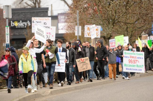 Hundreds of people march along Yale Road near Hodgins Avenue during a so-called Fraser Valley Freedom Rally on Saturday, April 3, 2021.Jenna Hauck/ Chilliwack Progress file
