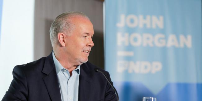 B.C. Premier John Horgan announcing "real climate action" in 2017. Credit: BC NDP / Flickr