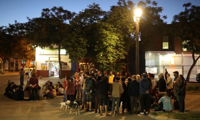 Neighbours gather while taking part in a neighborhood town hall meeting in Santiago earlier this month. Photograph: Pablo Sanhueza/Reuters