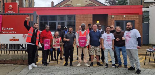British postal workers picketed outside a Royal Mail delivery office in Fulham on October 25, one of hundreds of pickets across the country. Next up are strikes on Black Friday and Cyber Monday, the busiest online shopping days of the year. Photo: CWU