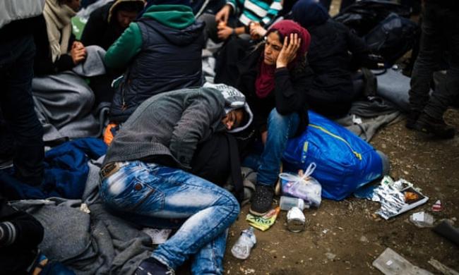 Refugees at the Greek-Macedonian border in 2016. ‘In the 21st century rising resource consumption has matched or exceeded the rate of economic growth.’ Photograph: Dimitar Dilkoff/AFP/Getty Images