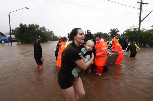 Lismore residents in NSW evacuate from worst floods in the regional city's history. Jason O'Brien/APP 