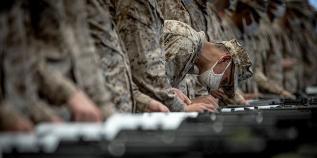 A recruit receives his weapon at the Marine Corps Recruit Depot in San Diego on March 1, 2021. Photo: Lance Cpl. Zachary Beatty/ U.S. Marine Corps