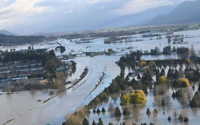 Climate-related disasters like 2021 flooding in the Fraser Valley will take an increasing economic and human toll. Photo via City of Abbotsford.