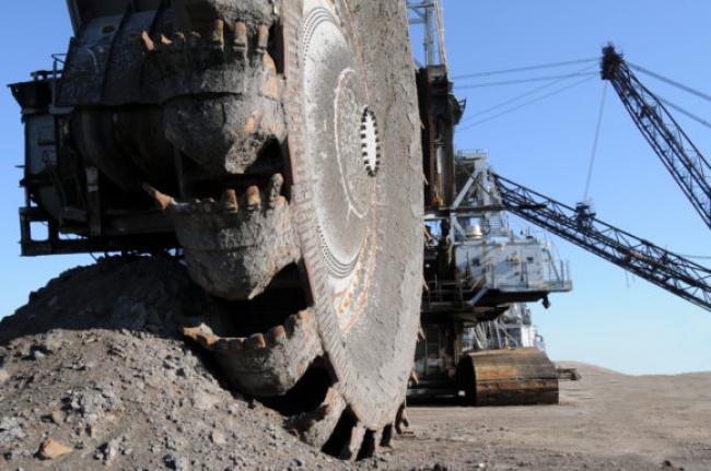 Photograph: Mining equipment called a bucketwheel reclaimer is used at oil sands mines in Alberta, Canada.