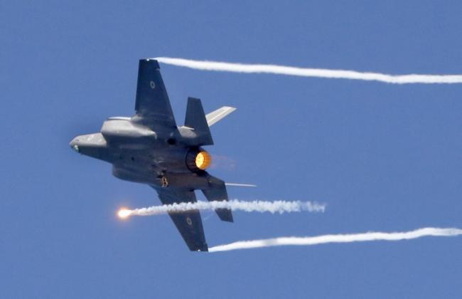 A US-made Israeli F-35 fighter jet performs during an air show over the beach in the Mediterranean coastal city of Tel Aviv, 9 May 2019 (AFP)