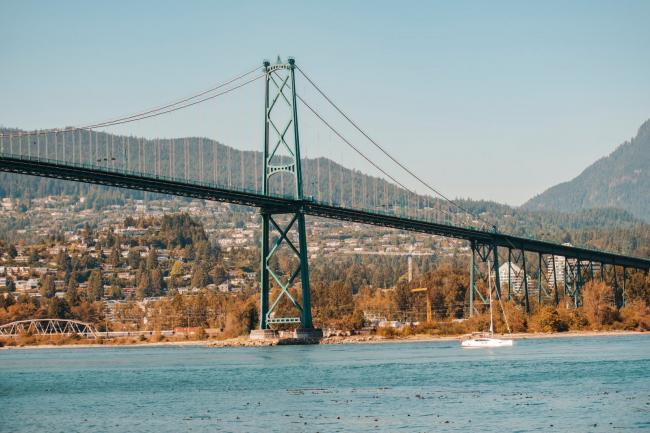 Lions Gate Bridge Vancouver BC - Government and its critics agree infrastructure needs to be built for a changing climate, but how it's financed will be pivotal to the type of infrastructure Canadians get. Photo by Andy Li / Unsplash