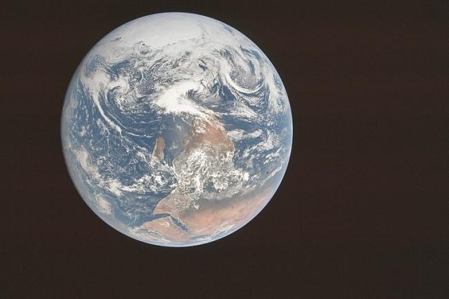 The original photo of the famous ‘Blue Marble’ image, depicting Earth as seen by the Apollo 17 crew on December 7, 1972. Photo via NASA via Wikimedia Commons https://commons.wikimedia.org/wiki/File:Apollo_17_Blue_Marble_original_orientation_(AS17-148-22727).jpg