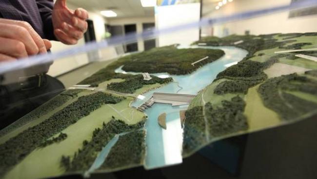 A model of the proposed Site C dam on the Peace River is seen at the Community Consultation Office in Fort St. John on Jan. 16, 2013. Roland Willson, chief of the West Moberly First Nations, asked the federal government to hit pause on BC Hydro’s $9-billion hydro project to allow time for a review of the assessment process and to look for alternative energy sourc (Deborah Baic/The Globe and Mail)