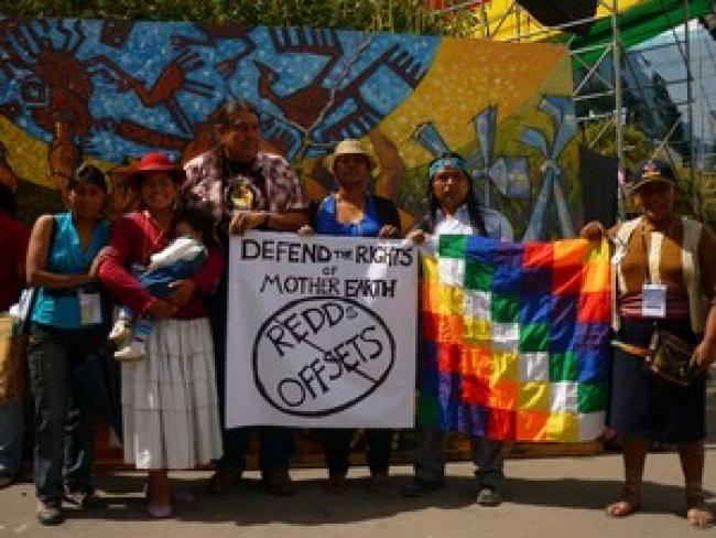 Bolivians rally in support of a Bolivian government law passed last year that grants rights to Mother Earth.