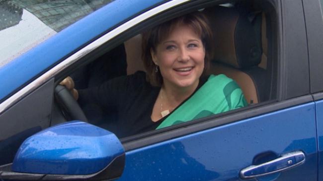 B.C. Premier Christy Clark arrives at an announcement about incentives for electric cars. (Glen Kugelstadt/CBC)