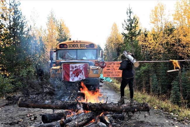 A roadblock preventing Coastal GasLink from accessing a site where it plans to drill under the Morice River, or Wedzin Kwa to the Wet’suwet’en. RCMP have visited the site several times since the camp was created on Sept. 24, making two arrests. Photo by Amanda Follett Hosgood.