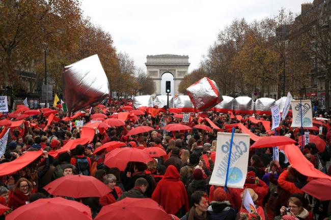 A demonstration near the Arc de Triomphe in Paris on Saturday to show support for actions against climate change. Credit Thibault 