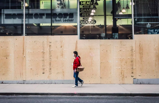 A man walks down an empty Yonge Street in Toronto. Photo by Myles Herod/Instagram.
