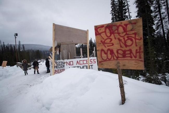 A checkpoint is seen at a bridge leading to the Unist'ot'en camp on a remote logging road near Houston, B.C., on Thursday, Jan. 17, 2019. File photo by The Canadian Press/Darryl Dyck