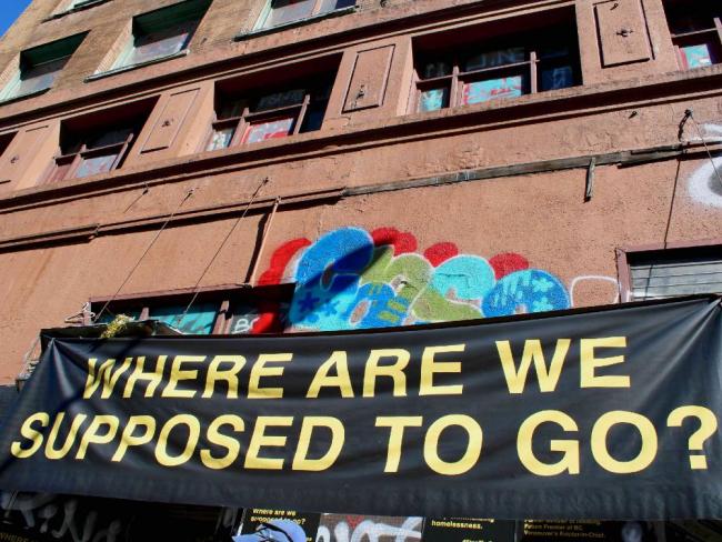 A 2022 decampment protest in front of the Balmoral Hotel on East Hastings Street. ‘There is a public consensus that government needs to act,’ writes former minister of Social Development and Poverty Reduction Shane Simpson. Photo by Jen St. Denis.