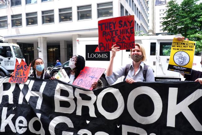 Environmentalists launch a gas bill strike outside National Grid's MetroTech Center headquarters on June 1. Photo by Kevin Duggan
