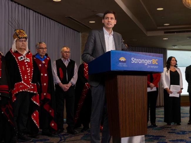 Premier David Eby announced approval for the Haisla Nation’s LNG project Tuesday. Chief Councillor Crystal Smith, in black dress and white shirt, said the decision ‘is about changing the course of history for my nation and Indigenous peoples everywhere.’ Photo via BC government.