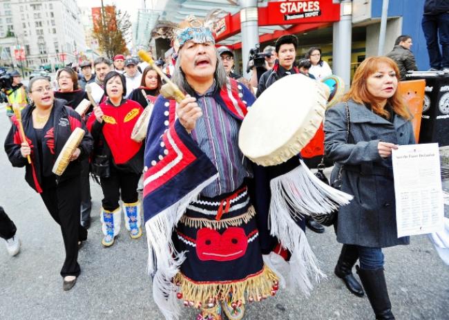 A coalition of First Nations groups march in Vancouver on Dec. 2, 2010 to protest Enbridge’s proposed Northern Gateway pipeline