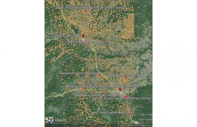 Yellow dots are wells; red dots are schools in the Dawson Creek/Fort St. John area.