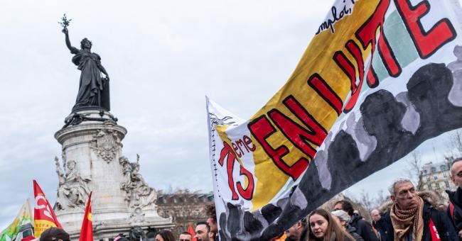 A procession of demonstrators marched in front of the statue of the Republic with trade union flags and banners calling for struggle on December 19, 2019, the fifteenth day of a national strike. (Photo: Samuel Boivin/NurPhoto/Getty Images)   