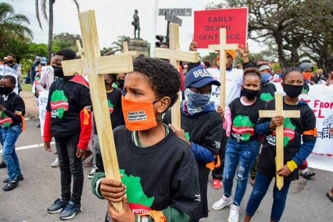A Global Climate Strike march makes its way through Durban, South Africa, October 2020. (Darren Stewart / Gallo Images via Getty Images)