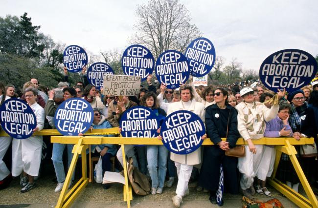 Demonstrators attending a pro-choice rally at the US Capitol in Washington DC, 1989. (Ron Sachs / CNP / Getty Images)