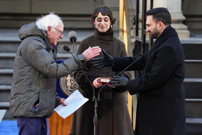 Senator Bernie Sanders shakes hands with Mayor Zohran Mamdani after Mamdani's ceremonial inauguration at City Hall on January 1, 2026, in New York City. (David Dee Delgado / Getty Images)