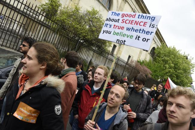 PARIS, FRANCE - APRIL 22: As part of a global movement March for Science protesters march to demonstrate on April 22, 2017 in Paris to oppose Trump’s rejection of science, climate change, global warming and the rise of misinformation. (Photo by John van Hasselt/Corbis via Getty Images)