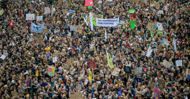 Thousands of demonstrators gather at the Jungfernstieg in Hamburg during one of many Global Climate Strikes in September. (Photo: Axel Heimken/Picture Alliance via Getty Images)