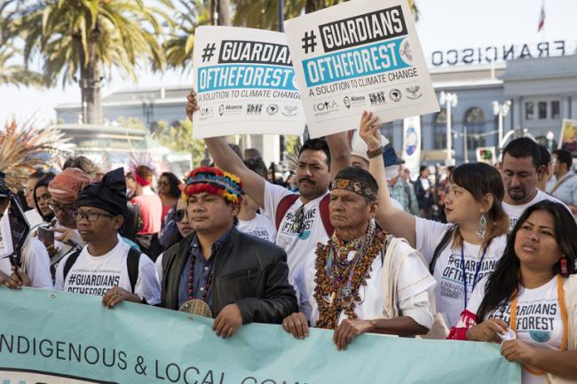 Indigenous activists with the Guardians of the Forest coalition take part in the Rise For Climate day of action in San Francsco, California on September 8, 2018. Photo Credit: Joel Redman/If Not Us Then Who.