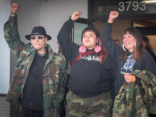 Corey Jocko, left, Shaylynn Sampson, centre, and Sleydo’ Molly Wickham, right, leave the Smithers courthouse on Friday after learning that they will not receive jail time for blocking access to the Coastal GasLink pipeline four years ago. Photo for The Tyee by Amanda Follett Hosgood.