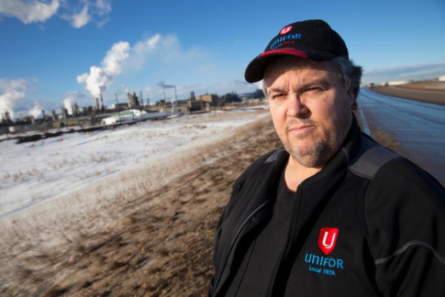 Unifor local president Ken Smith near the Syncrude oil sands operations north of Fort McMurray in March. Photo by Mychaylo Prystupa.