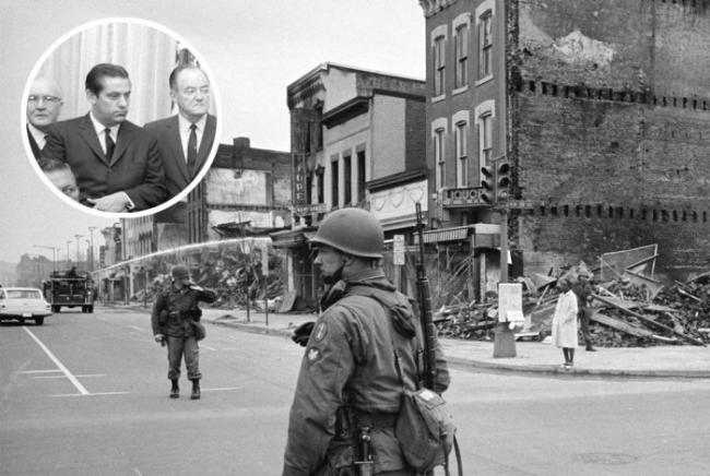 ‘US News & World Report’ photograph of soldier standing guard on the corner of 7th & N Street NW in Washington, DC, with the ruins of buildings destroyed during the riots following the assassination of Martin Luther King Jr. on April 8, 1968. Oklahoma Senator Fred Harris (D-OK) with members of the Kerner Commission (inset). Photo credit: Library of Congress / Wikimedia and Library of Congress / Wikimedia