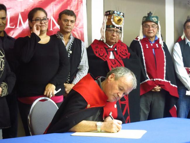 'Support to stop this LNG project is overwhelming,' says Hereditary Chief Yahaan, first to sign the declaration. Photo: Friends of Wild Salmon.