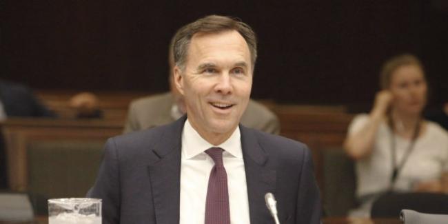 PATRICK DOYLE/CP Finance Minister Bill Morneau appears at the Commons committee on the statutory review of the Proceeds of Crime and Terrorist Financing Act in Ottawa on June 20, 2018.