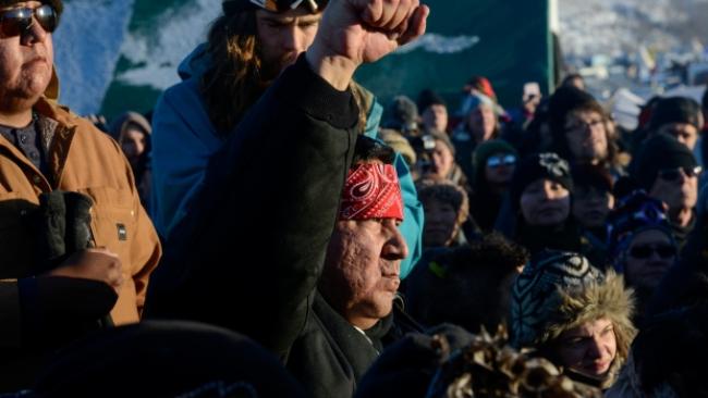 Protesters shouted 'water is life' upon learning Dakota Access Pipeline construction had been halted nearing the Standing Rock reservation. (Stephanie Keith/Reuters)