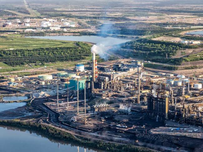 An oil refinery near Fort McMurray. The Canada Pension Plan Investment Board owns 90 per cent of a Calgary-based oil and gas company that signed an open letter calling for withdrawal of the federal oil and gas emissions cap. Photo via Shutterstock.