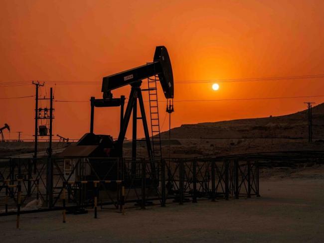 An oil rig in Bahrain. The war in nearby Iran is driving unprecedented profits for Canada’s fossil fuels industry and those revenues should be taxed to support public services, writes the author. Photo via Shutterstock.