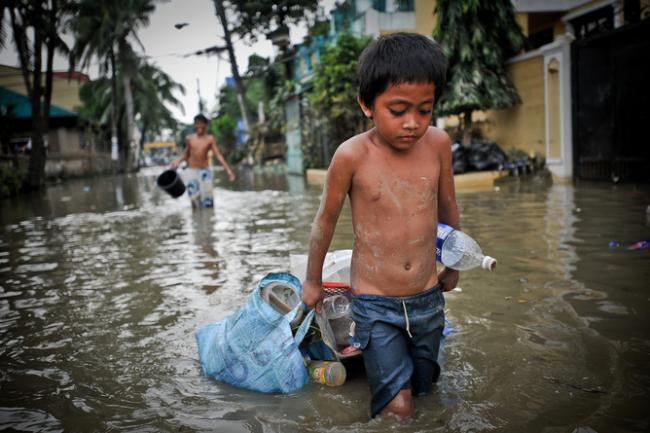 Poor people are more vulnerable to the effects of climate change, such as extreme weather and sea level rise, yet have contributed little to the causes. asiandevelopmentbank/flickr, CC BY-NC-ND